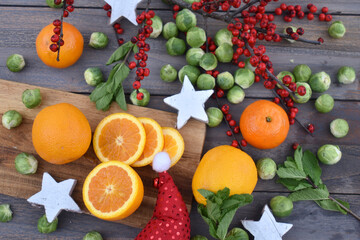 Festive food flatlay with citrus fruits and brussels spouts for christmas