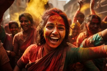 Happy smiling Indian people celebrating holi festival covered in colorful powder paints on the streets of city.
