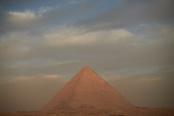 Fototapeta na wymiar View of the great pyramid of Cheops at sunrise