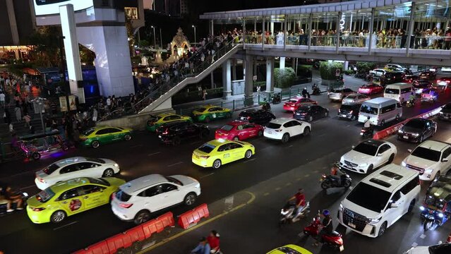 traffic of cars and people in a modern city. Bangkok, Thailand