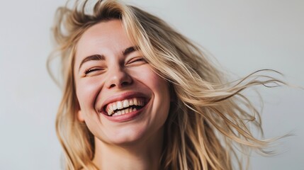 Beauty portrait of blonde smiling laughing woman 35 year clean fresh face isolated on white background