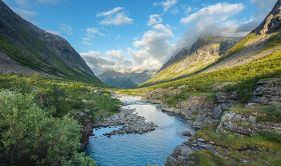 landscape with a U-shaped valley formed by glaciers during the last ice age, southwest Norway in...