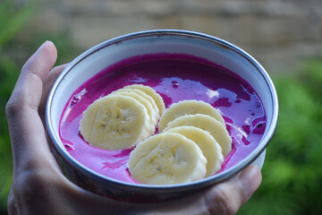 Superfood healthy food for a diet from dragon fruit, strawberries, bananas and honey