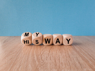 Turned wooden cubes and changes concept word his way to my way. Beautiful wooden table, blue...