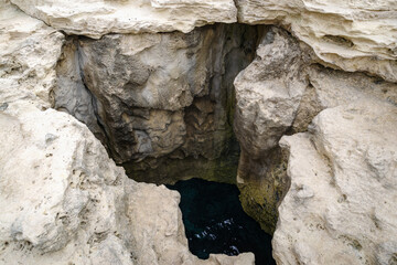 Grotta della Poesia coast cliff, Salento, Apulia, Italy