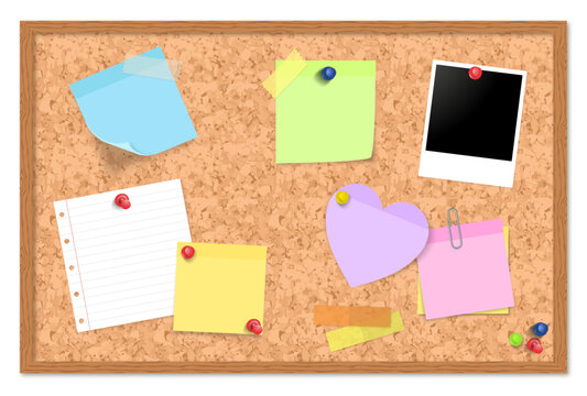 bulletin board cork board with post it notes paper pohoto polaroid clip and pins heart post it tape