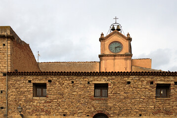 Scenic landscape view of ancient clock tower on the city square in the downtown of Castelbuono...