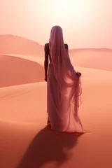 Fotobehang Koraal back view of woman in elegant dress walking by sahara dune at sunset, fashion concept