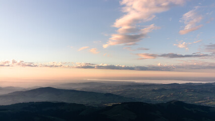 sunset in the mountains over lake