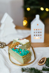 Cute Christmas cheesecakes. Sweet home made Festive Christmas cheesecake. Christmas new year decorations, dessert holiday food. 