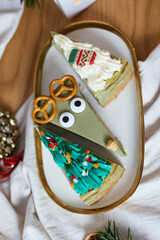 Cute Christmas cheesecakes. Sweet home made Festive Christmas cheesecake. Christmas new year decorations, dessert holiday food. 