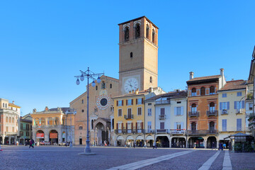 edifici colorati storici di lodi in piazza vittoria in italia, colorful historical buildings of...