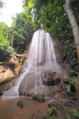 Obraz premium A gorgeous waterfall captured in long exposure, Thailand.