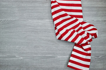 Red, White Striped Linen kitchen textile on gray wooden table