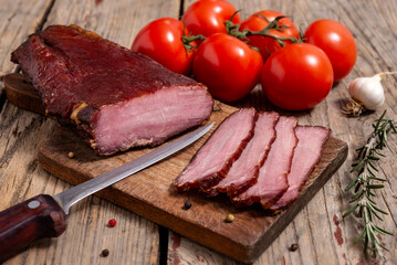 Dried meat on a wooden cutting board