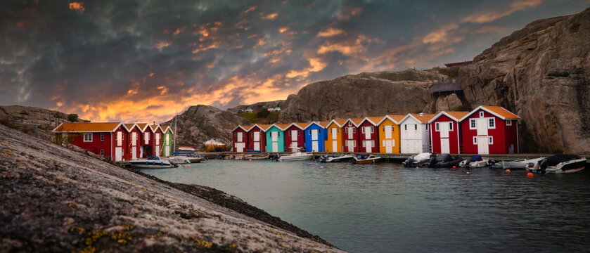 Small fishing huts near by the Water in the sunset, in Sweden called Smogen, West coast, Goteborg.