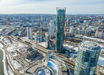 Fototapeta na wymiar Yekaterinburg skyscraper aerial panoramic view at spring or autumn in clear sunset. Yekaterinburg is the fourth largest city in Russia located on the border of Europe and Asia.