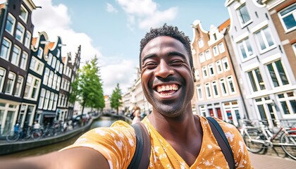 Happy tourist taking selfie picture in Amsterdam, Netherlands , Cheerful man using smart mobile phone device outside , Student traveler enjoying summer european vacation , Life style tourism