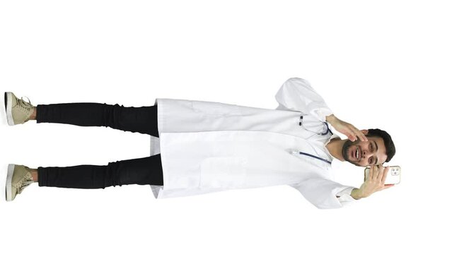 A man doctor conversate with phone on a white background
