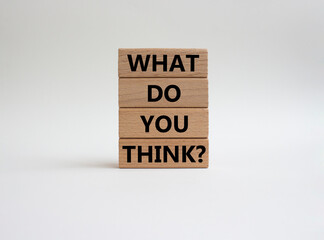 Naklejka premium What do you think symbol. Wooden blocks with words What do you think. Beautiful white background. Business and What do you think concept. Copy space.