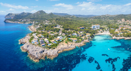 Aerial view with serene Cala N’Aladern and family-friendly Sa Font de Sa Cala, nestled on Mallorca's untouched eastern coast.