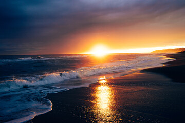 Fototapeta na wymiar Mediterranean sea surf line sunset landscape photo. Beautiful nature scenery photography with bright sky