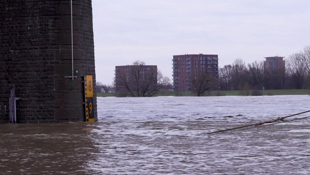 Flooding of the river Rhine, Arnhem, the Netherlands, A part of the John Frost Bridge shows the water level.