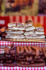 Home traditional production of smoked bacon, ham and meat in a home smokehouse. Natural ecological bio product. Canning by smoking