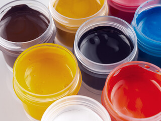 Jars of acrylic gouache paint art painting creativity and development