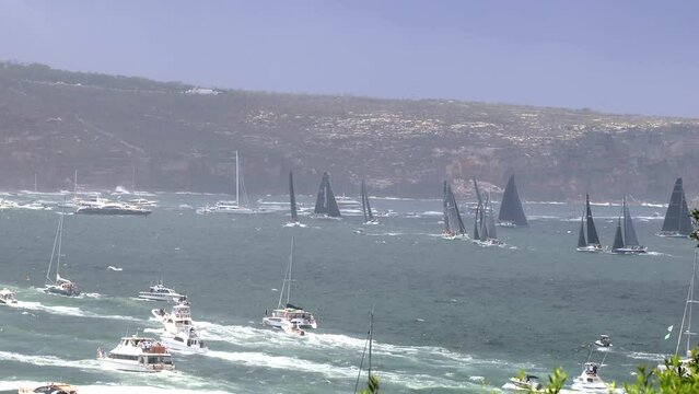 Time lapse of Sydney Hobart Yacht race on Harbour turning South as 4k.
