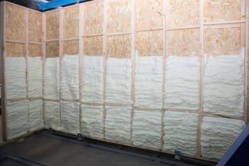 The wall is treated with foam for thermal insulation