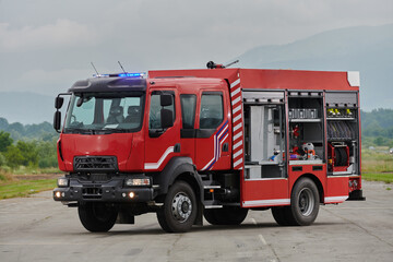 In this captivating scene, a state-of-the-art firetruck, equipped with advanced rescue technology,...