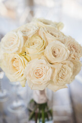 A bouquet of white wedding roses.