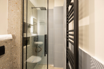 Bathroom interior with glass shower cabin