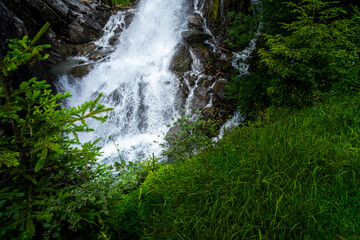 Hiking to the Parcines Waterfalls near Meran in South Tyrol Italy.  - obrazy, fototapety, plakaty