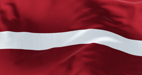 Close-up of Latvia national flag waving in the wind.