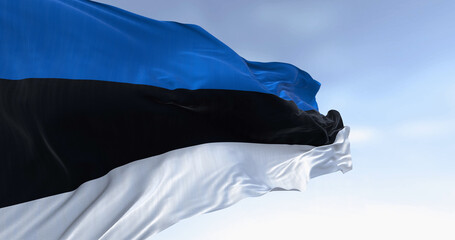 National flag of Estonia waving in the wind on a clear day