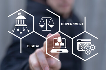 Man using virtual touch screen sees text: DIGITAL GOVERNMENT. Electronic government concept. Modern governance technologies. Digitalization. Digital transformation public government sector.