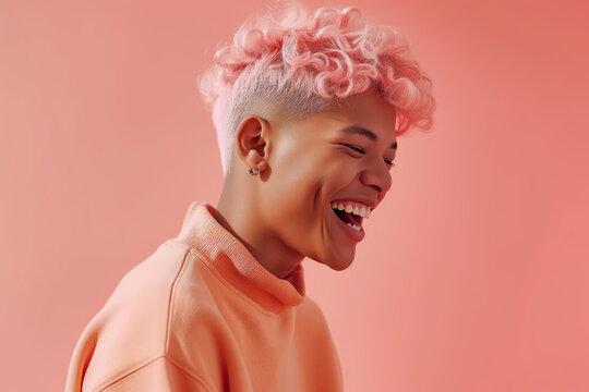 Man with soft peach hair and an eye-catching piercing, seamlessly blending into a peach fuzz colored background - Powered by Adobe