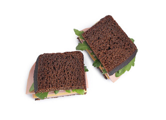 Delicious sandwiches with boiled sausage, cheese and arugula isolated on white, top view