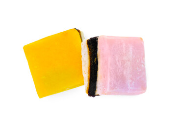 Tasty liquorice candies isolated on white, top view