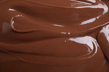 Tasty chocolate paste as background, closeup view