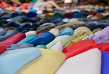 Colorful bolts of fabric in Hanoi market - obrazy, fototapety, plakaty
