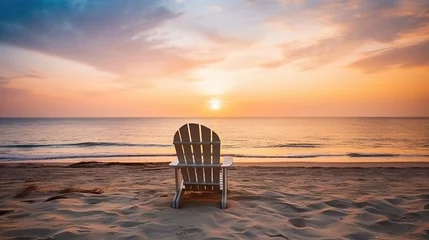 Photo sur Plexiglas Coucher de soleil sur la plage Two deck chairs for sunbathing on the beach, view at sunset. beautiful colorful sunset