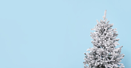 Beautiful Christmas tree on blue background