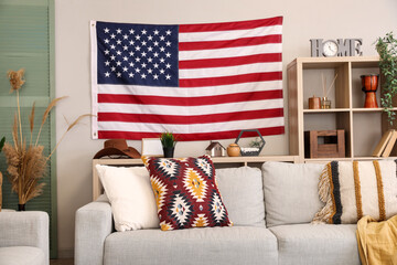Interior of stylish living room with hanging USA flag