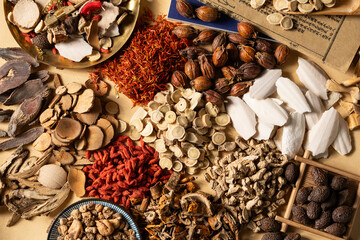 Ancient Chinese medicine and different herbal ingredients on table. - obrazy, fototapety, plakaty