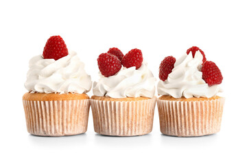Tasty raspberry cupcakes on white background