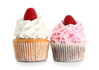 Tasty raspberry cupcakes on white background