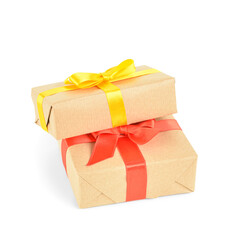 Christmas gift boxes with yellow and red ribbons on white background